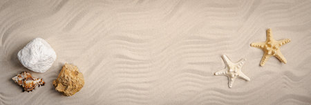 Sea sand with starfish and seashellsの写真素材