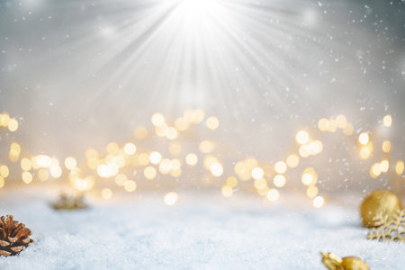 Christmas Holiday background with snow, fir tree and decorations with christmas light behind. Christmas white and golden balls on a winter festive background.の写真素材