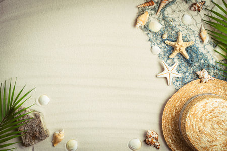 White sea sand with starfish and seashells. Top view with copy space. Summer beach. Sea summer vacation backgroundの写真素材