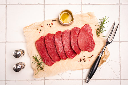 Raw sliced beef or lamb tenderloin meatの写真素材