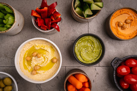Various hummus dips, healthy and vegan snackの写真素材