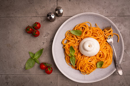 Pasta spaghetti with burrata and tomatoesの写真素材