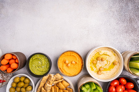 Various hummus dips, healthy and vegan snackの写真素材