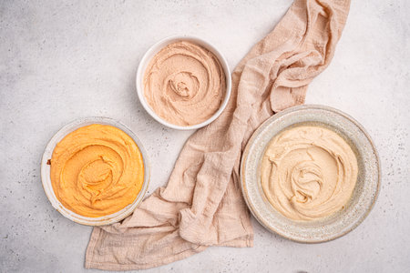 Various hummus dips, healthy and vegan snackの写真素材