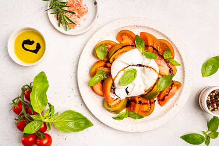 Caprese salad with burrata cheeseの写真素材
