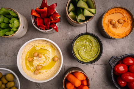 Various hummus dips, healthy and vegan snackの写真素材