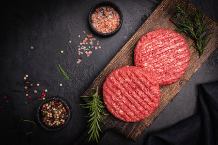 Raw steak burgersの写真素材