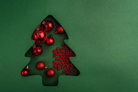 Red Christmas Ornaments and Snowflake in Tree Cutoutの写真素材
