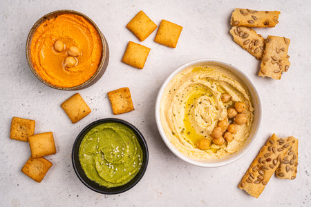 Various hummus dips, healthy and vegan snackの写真素材