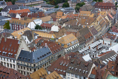 Various tiled roofs of historical buildings in Strasbourg city centerの写真素材