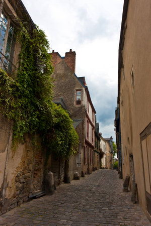 Cute narrow street in a small town in France.