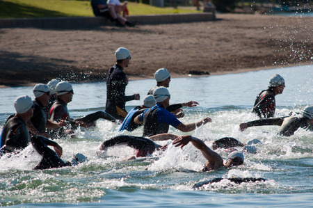 Swimming Portion of Triathalon, Lake Chapparel Triathalon, Calgary, Alberta, August 7th, 2011.のeditorial素材