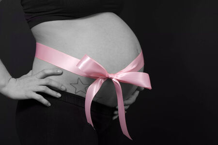 Pregnant with ribbonの写真素材
