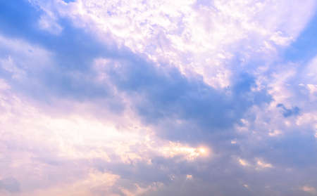 Various types of cloud formations in the sky and coloring in different ways during sunset and...