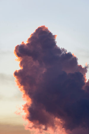 Silhouette of an urban city, tree and beautiful cloud formation at sunset landscape photography