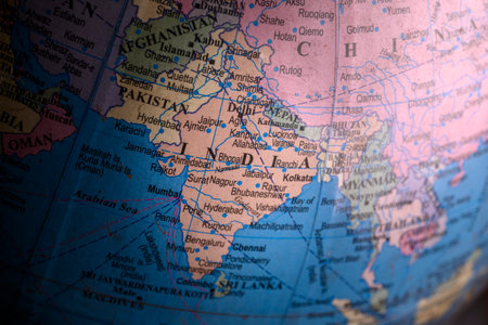 Political Indian map on a classroom globe closeup photographyの写真素材
