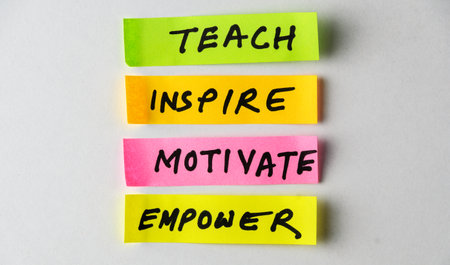 Four colorful sticky notes display motivational words like Teach, Inspire, Motivate and Empower,...