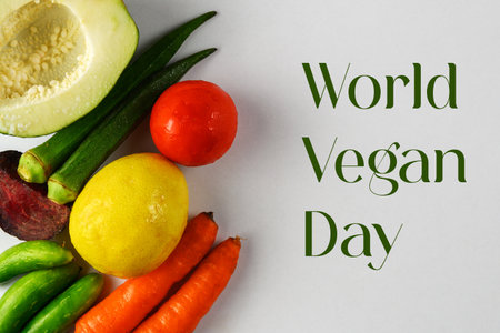 Arrangement of fresh vegetables, including avocado, lemon, carrot, and more, placed against a clean white background, emphasizing health, nutrition, and freshness in a visually simplistic style.の写真素材