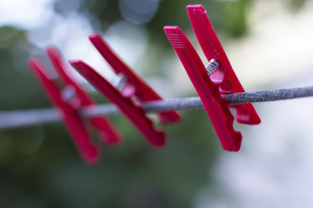 three tweezers for drying clothesの写真素材