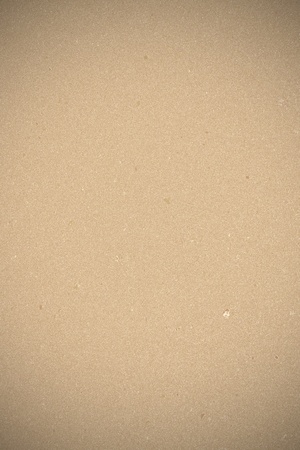 sheet of cork board with vignette as backgroundの写真素材