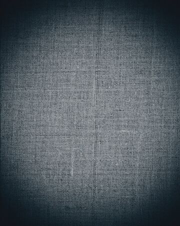 aged dark grey fabric as vintage background for insert text or design の写真素材