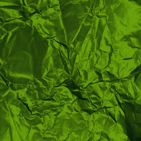 green crumpled metallic canvas textureの写真素材