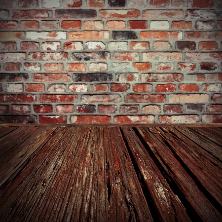 brick wall and wood floor background of old cellarの写真素材