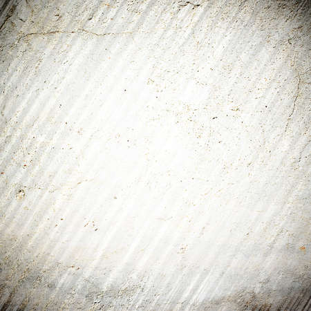 white grunge wall with vignette and delicate shadow stripesの写真素材