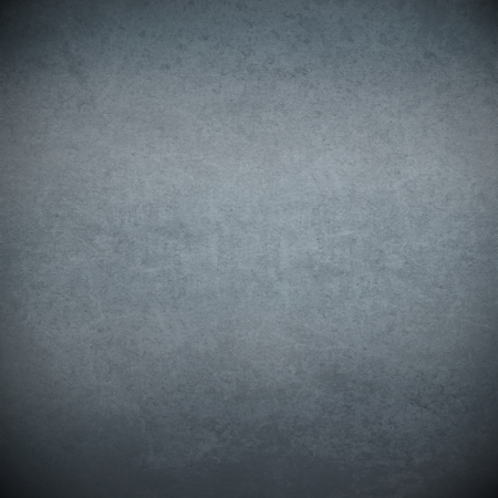 dark gray felt fabric texture background with vignetted cornersの写真素材