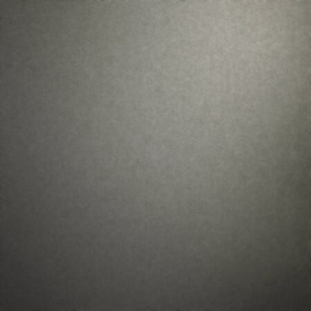 dark grey felt fabric texture background with delicate beam of light and vignetteの写真素材
