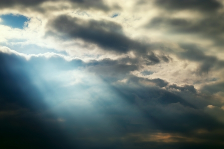 dark sky stormy clouds and blue lighting effectsの写真素材