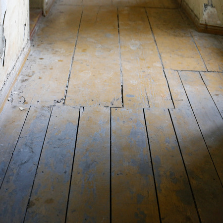 old floor texture and beam of daylightの写真素材
