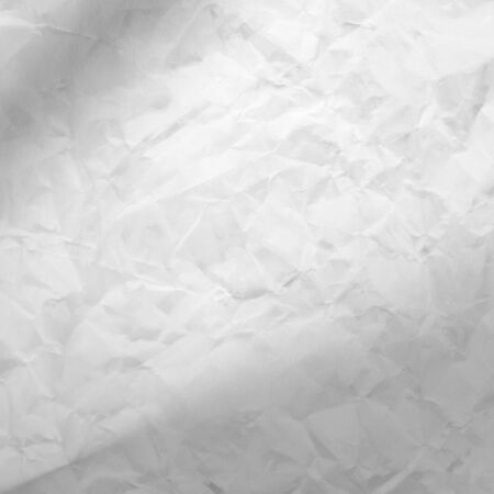 bright background crumpled paper texture and beam od spot lightの写真素材