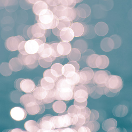 decorative bokeh background texture, light reflections in water
