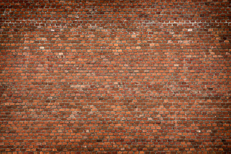 red brick wall texture grunge background with vignetted corners, may use to interior design