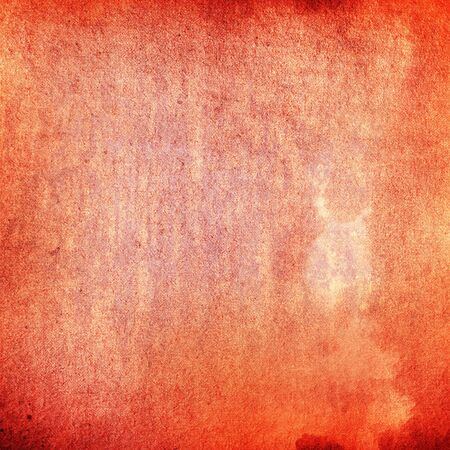 red grunge paint texture on old canvas backgroundの写真素材