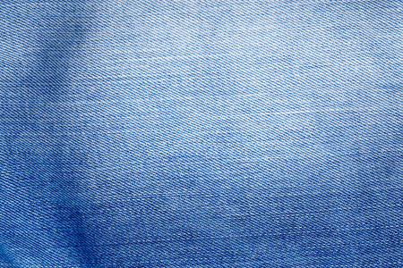 blue jeans fabric texture background, denim material texture subtle knit patternの写真素材