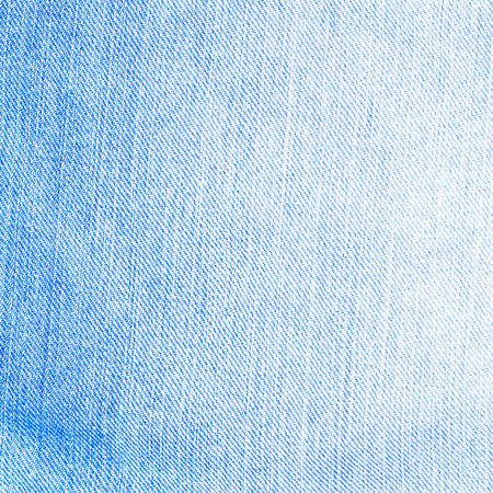 bright blue denim texture backgroundの写真素材