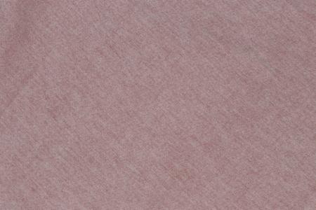 faded pink canvas texture backgroundの写真素材