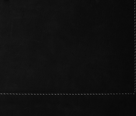 dark brown background stitched leather textureの写真素材