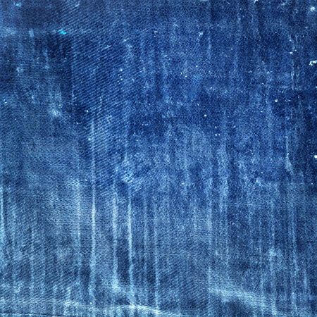 raw denim jeans texture blue abstract grunge backgroundの写真素材