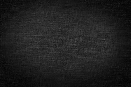black background canvas fabric texture backgroundの写真素材