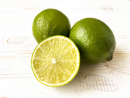 fresh cut lime on a wooden table