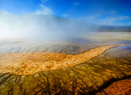 warm, wet mist and beautiful colors, thermal pools in Yellowstone National Park, Wyoming, USの写真素材