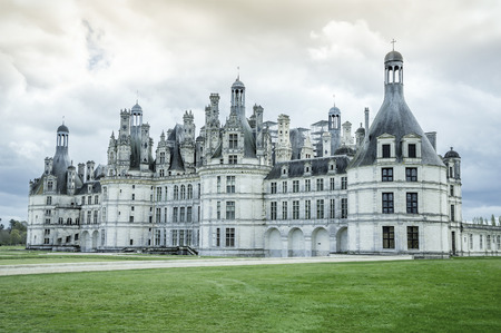Chambord castle, Loire Valley, France - artistic version of my photo. The royal castle Chambord is one of the most recognizable castle in the worldの写真素材