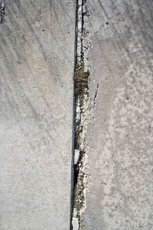 Old asphalt road surface texture with fissure