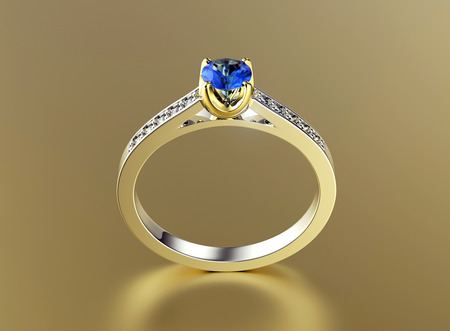 Golden Engagement Ring with sapphire. Jewelry backgroundの写真素材