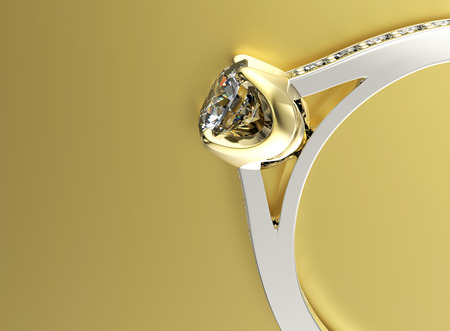 Golden Engagement Ring with Cognac Diamond. Jewelry backgroundの写真素材