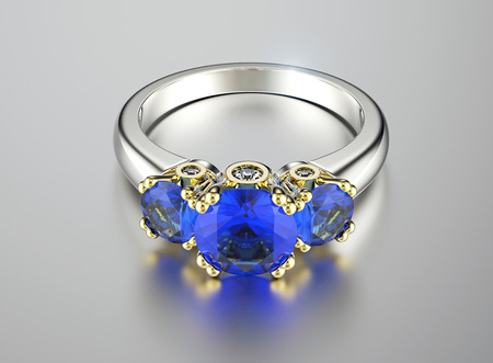 Golden Engagement Ring with sapphire. Jewelry backgroundの写真素材