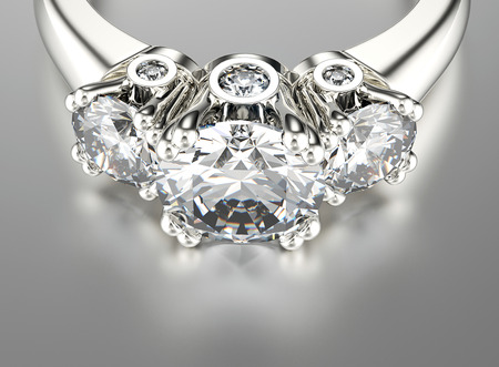Golden Engagement Ring with Diamond. Jewelry backgroundの写真素材